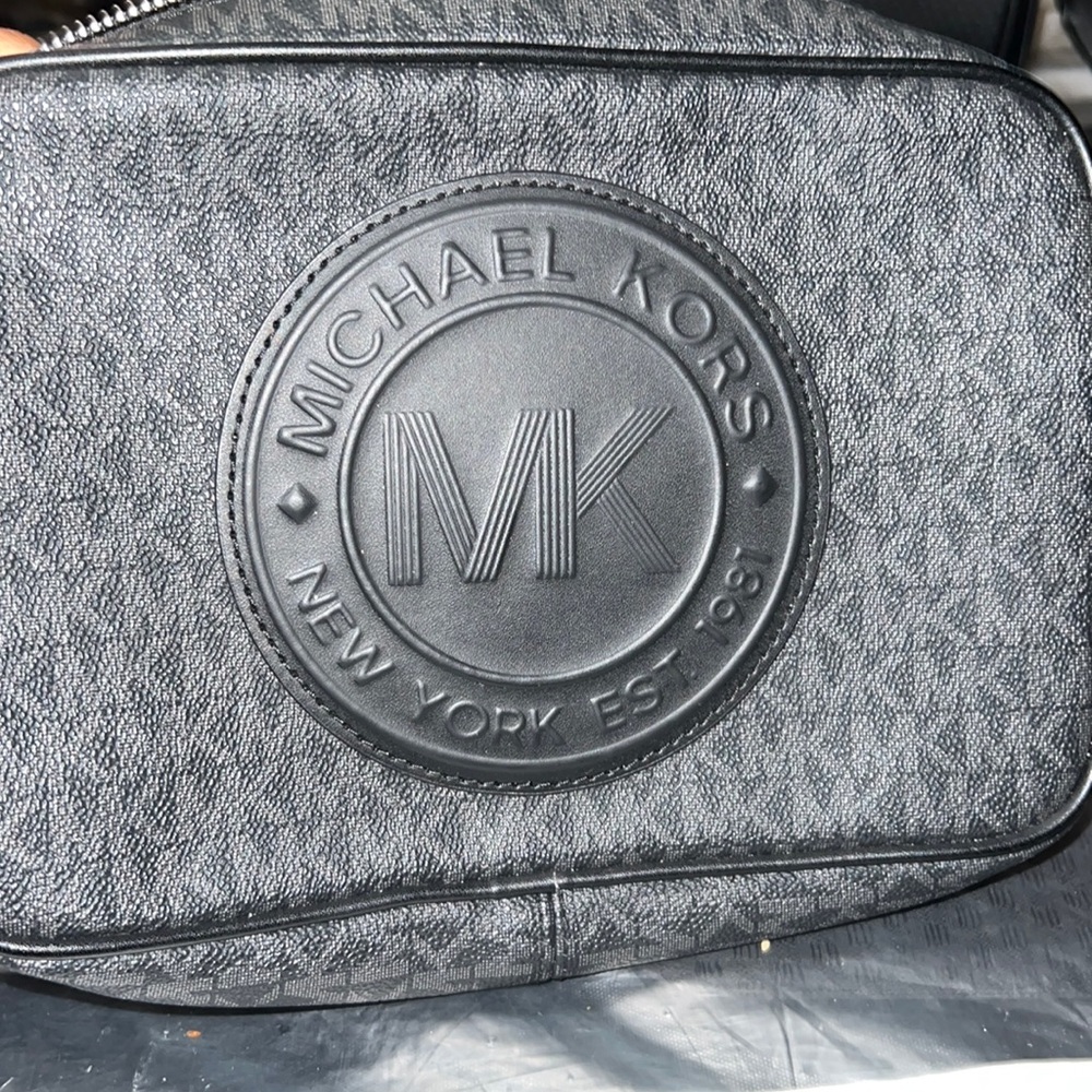 MK crossbody it’s black and a must have